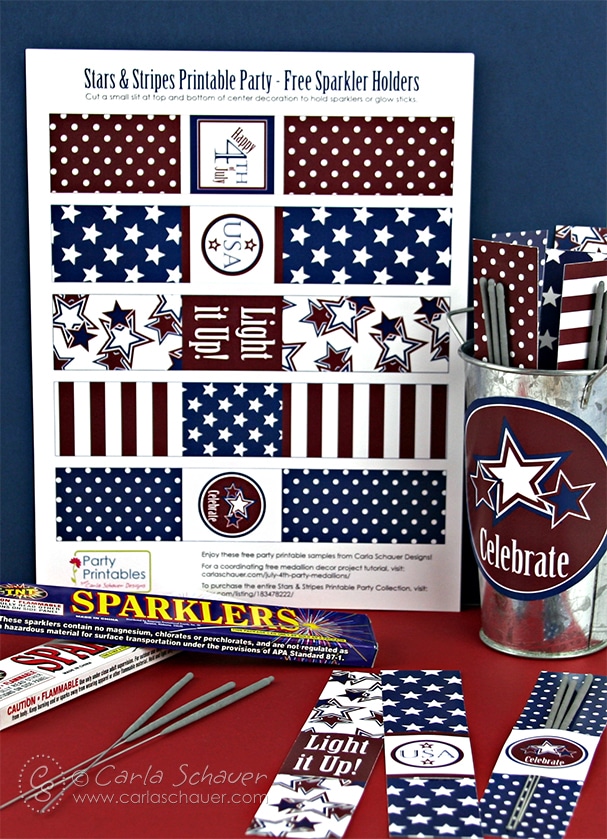Printed patriotic paper strips used as sparkler holders in patriotic display.