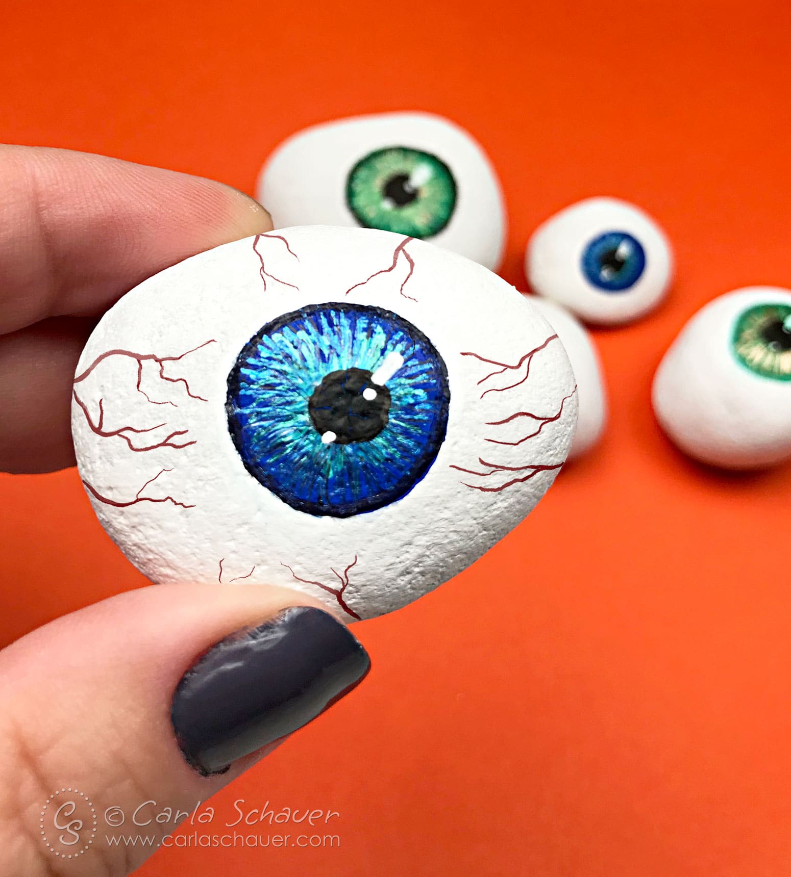 Make Halloween Painted Rock Eyeball Decorations with Pens