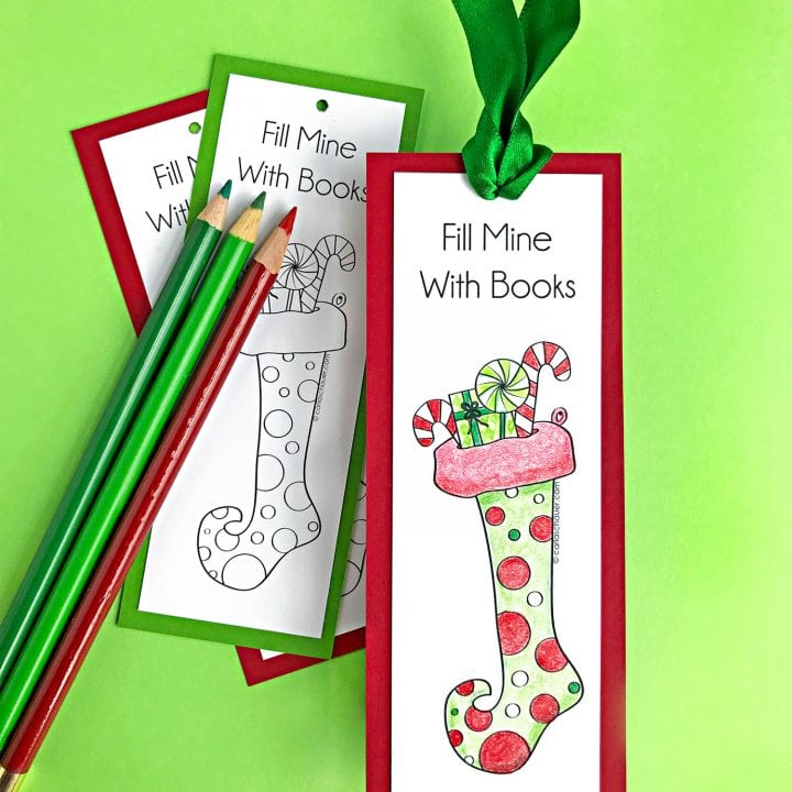 Red and Green stocking bookmark with colored pencils on green background.