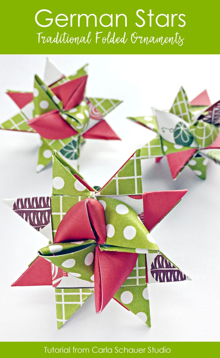 3 red and green folded paper star ornaments on white background with text for pinning