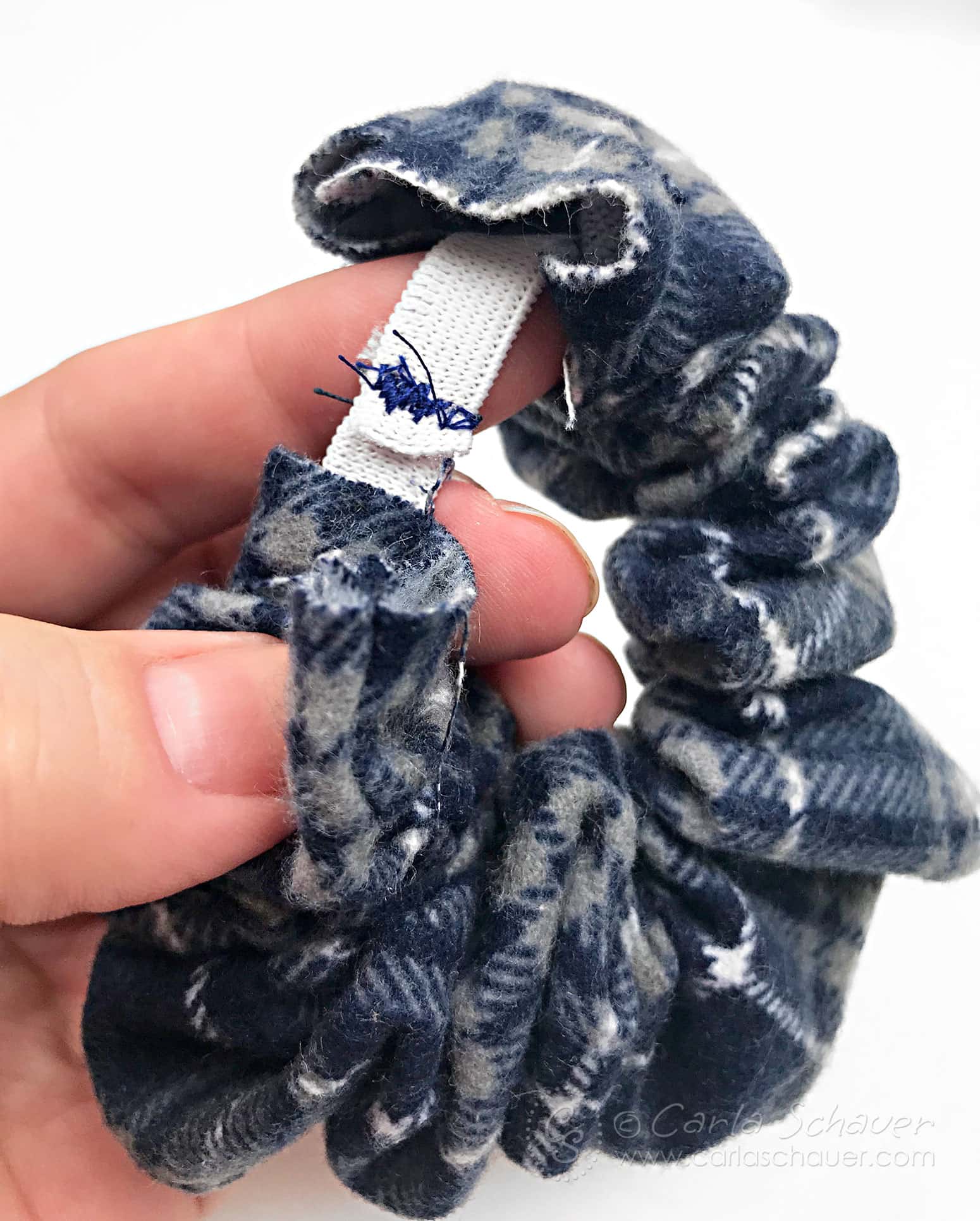 Sewn elastic in flannel scrunchie.