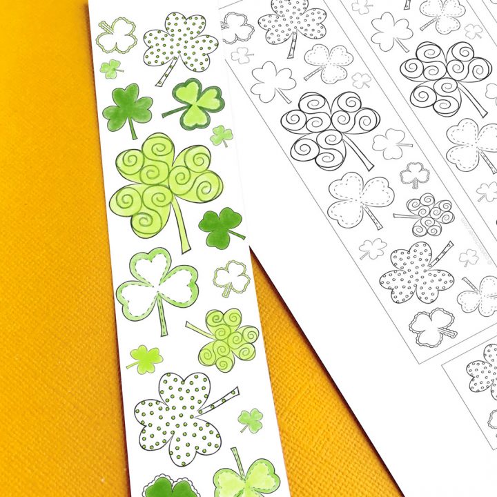 Colored shamrock printable bookmark and sheet on yellow background.
