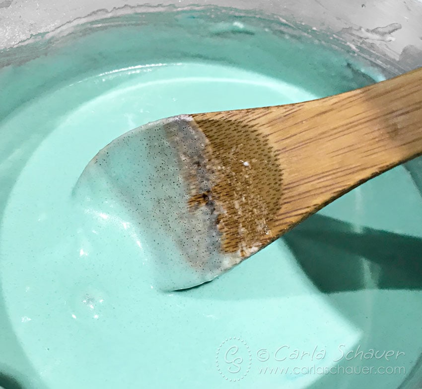Liquid cooked DIY playdough ingredients in saucepan.