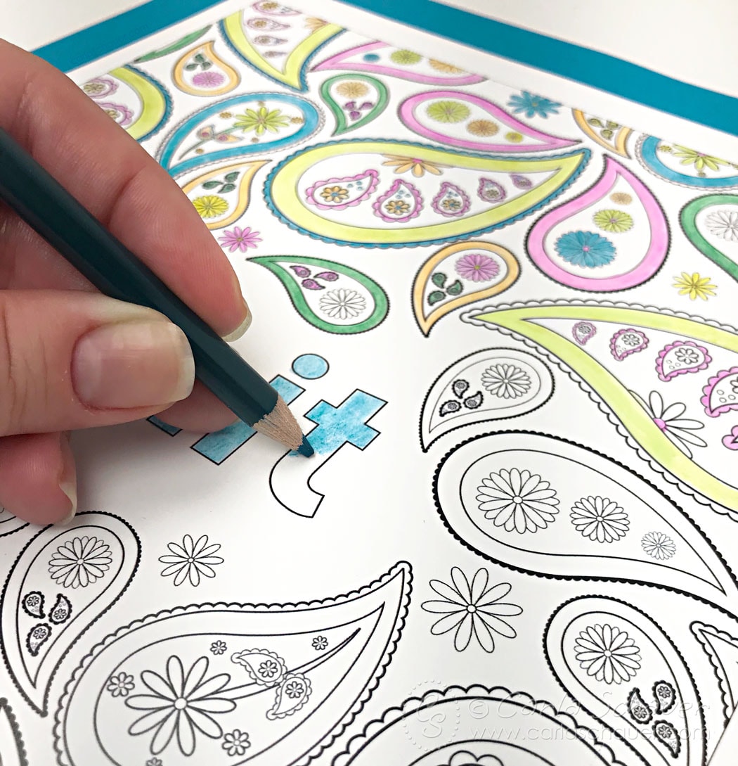 Coloring a cuss word coloring page with colored pencil
