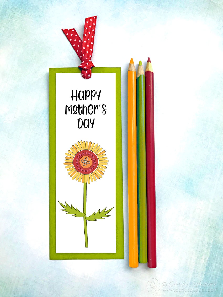 Happy Mother's Day bookmark with flower on blue background