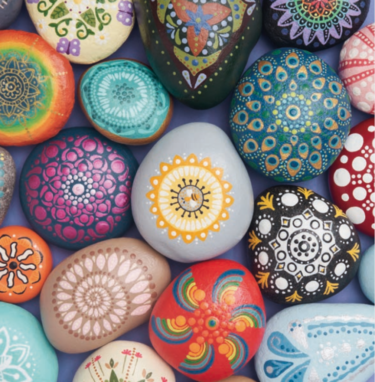 18 colorful painted rock mandalas with nature themes, lying next to each other with no gaps between.