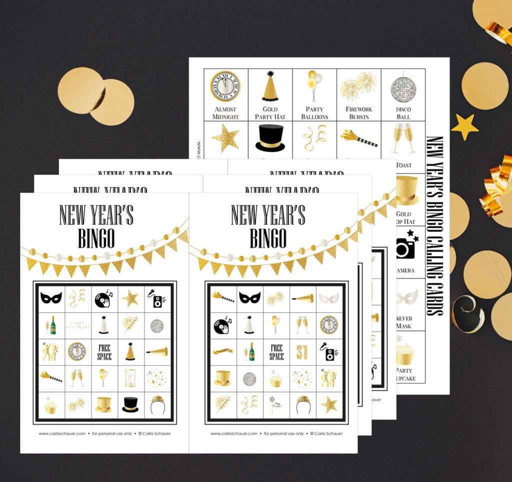 3 New Year's Bingo cards printed on white paper 2 per page, overlapping on a sheet of uncut calling cards. All are lying on a black background with shiny gold circles. Each bingo sheet has a 5x5 grid of party icons, a gold pennant banner, and black text that reads "New Year's BINGO"